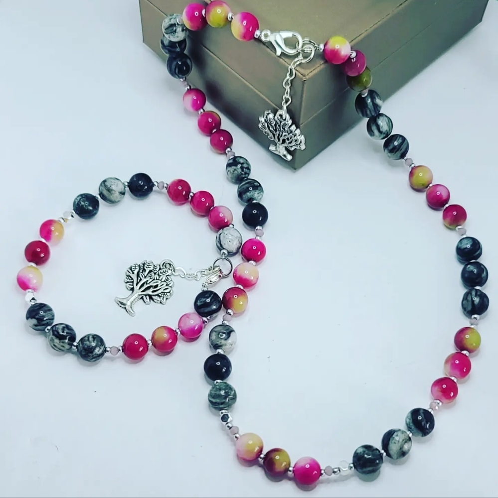 Rainbow Agate, rutilated Quartz set